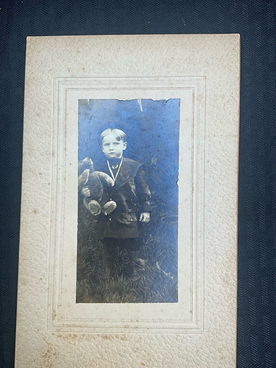 Antique cabinet card photo of young boy with his teddy bear. 9” x5”. Charles Shonesy is written on back. ~$ 35 postage paid